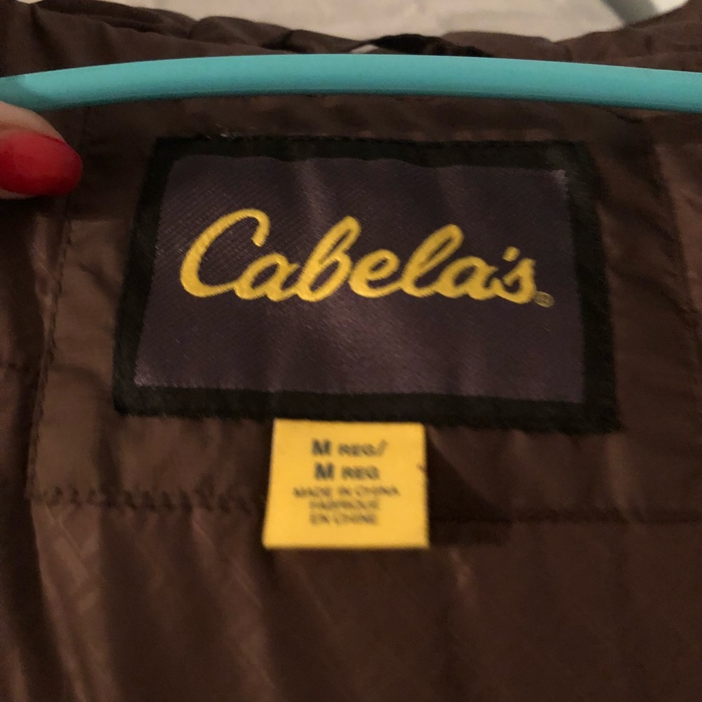 Woman’s brown coat